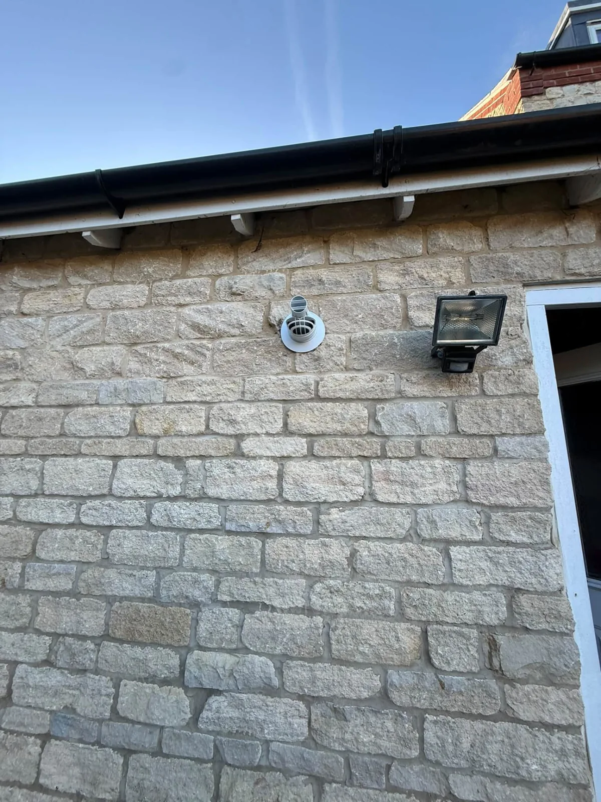 New boiler flue fitted by J Lamb, serving Rushden
